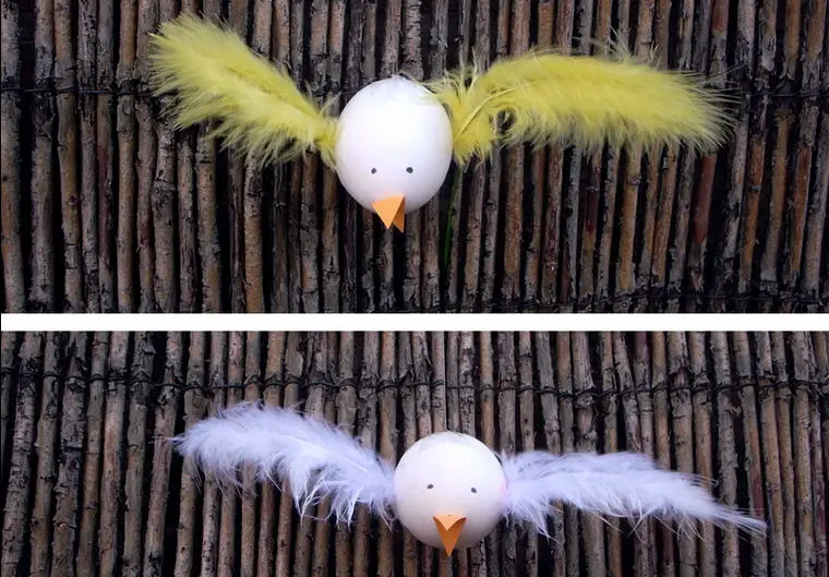 Huevos decorados como pájaros