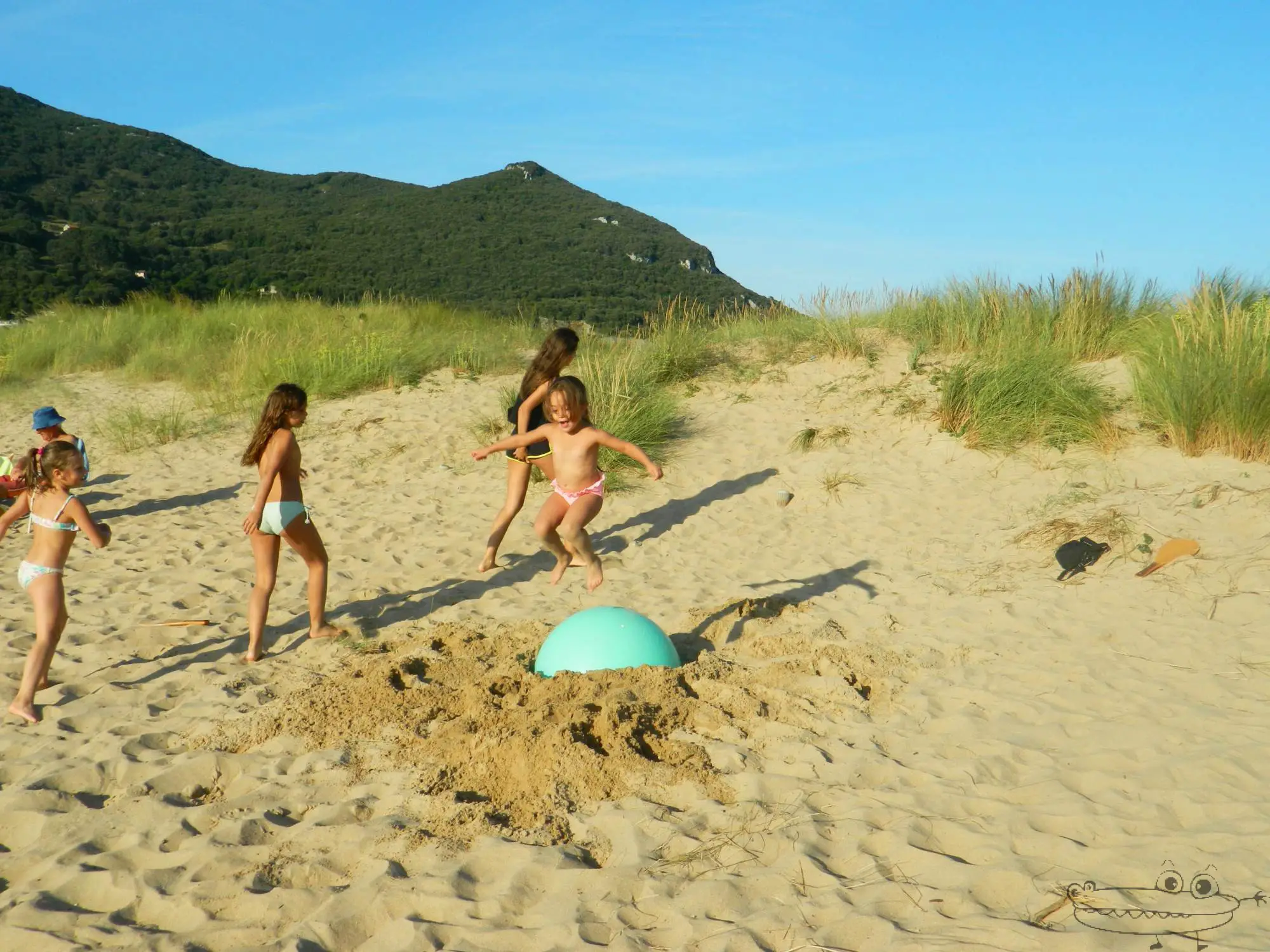 Juegos de playa pelota enterrada