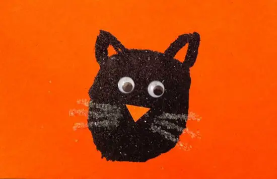 gato negro de purpurina para preescolares