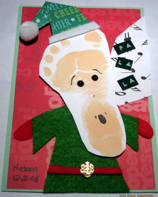 Tarjeta de Navidad con huellas de bebe